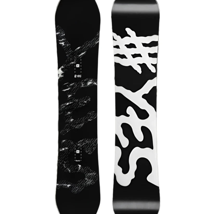 The Yes brand Basic Snowboard 2025 has a black base with white accents and distinctive squiggly lines running down the length.