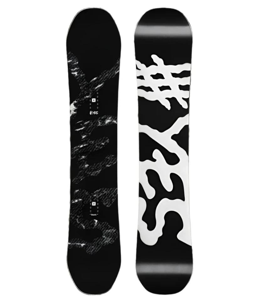 The Yes brand Basic Snowboard 2025 has a black base with white accents and distinctive squiggly lines running down the length.