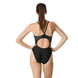 Speedo Tone Setter Splice Flyback Swimsuit - A black swimsuit with a subtle flyback pattern on the fabric.