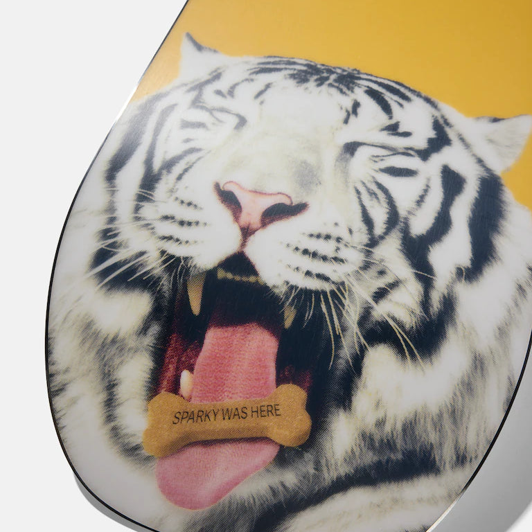 Burton Process Snowboard 2025 - A snowboard with a white background featuring a large, stylized "B" logo in black and red at its center.