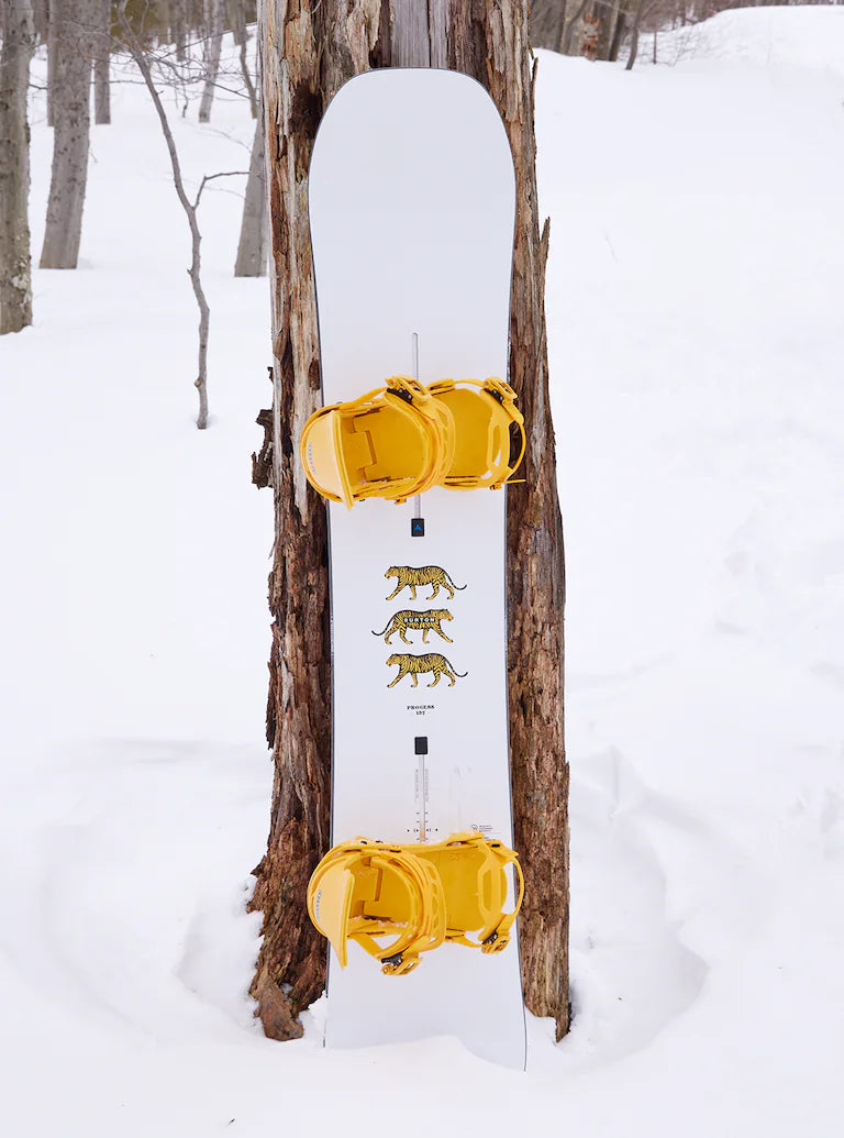Burton Process Snowboard 2025 - A white snowboard with three black tigers walking in a row on its bottom edge.