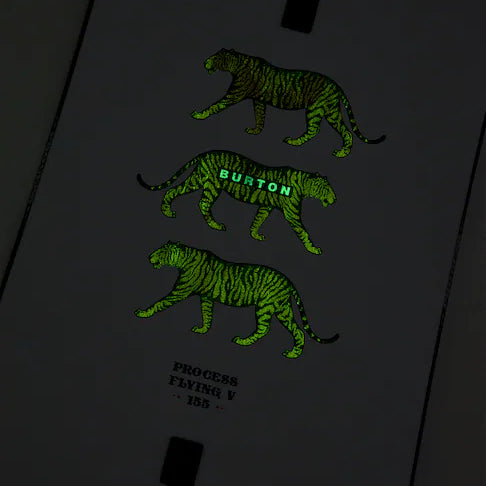 Burton Process Board Flying V Snowboard 2025 - A black snowboard with a white and green striped pattern on its top side.