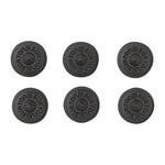 Burton Aluminum Stud Stomp Pad - A round, black stomp pad with a circular indentation in the center and "BURTON" embossed around the edge.