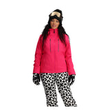 Obermeyer Women's Glade Insulated Jacket - A bright pink jacket with a high collar and zippered pockets, featuring black zippers and a black drawstring at the waist.