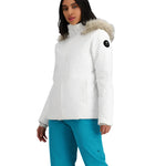 Obermeyer Women's Tuscany Elite Insulated Jacket 2025 - A white down-filled puffer jacket with a fur-lined hood and zippered pockets.