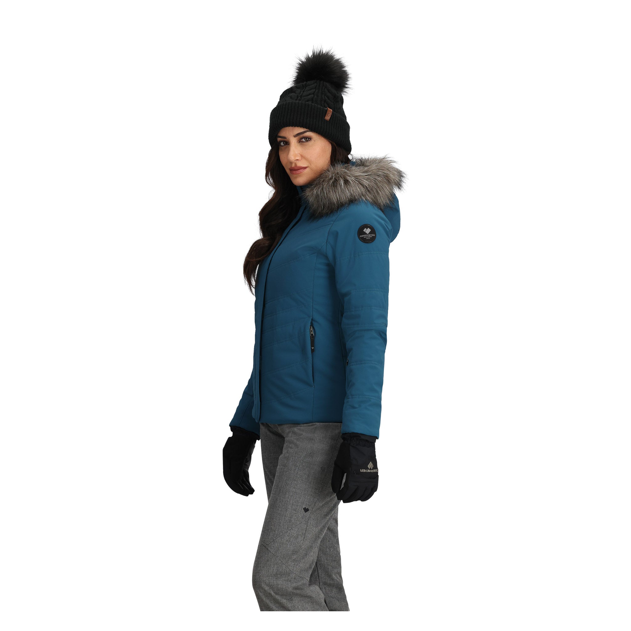 Obermeyer Women's Tuscany Elite Insulated Jacket - A blue jacket with a fur-lined hood and two zippered pockets on either side.