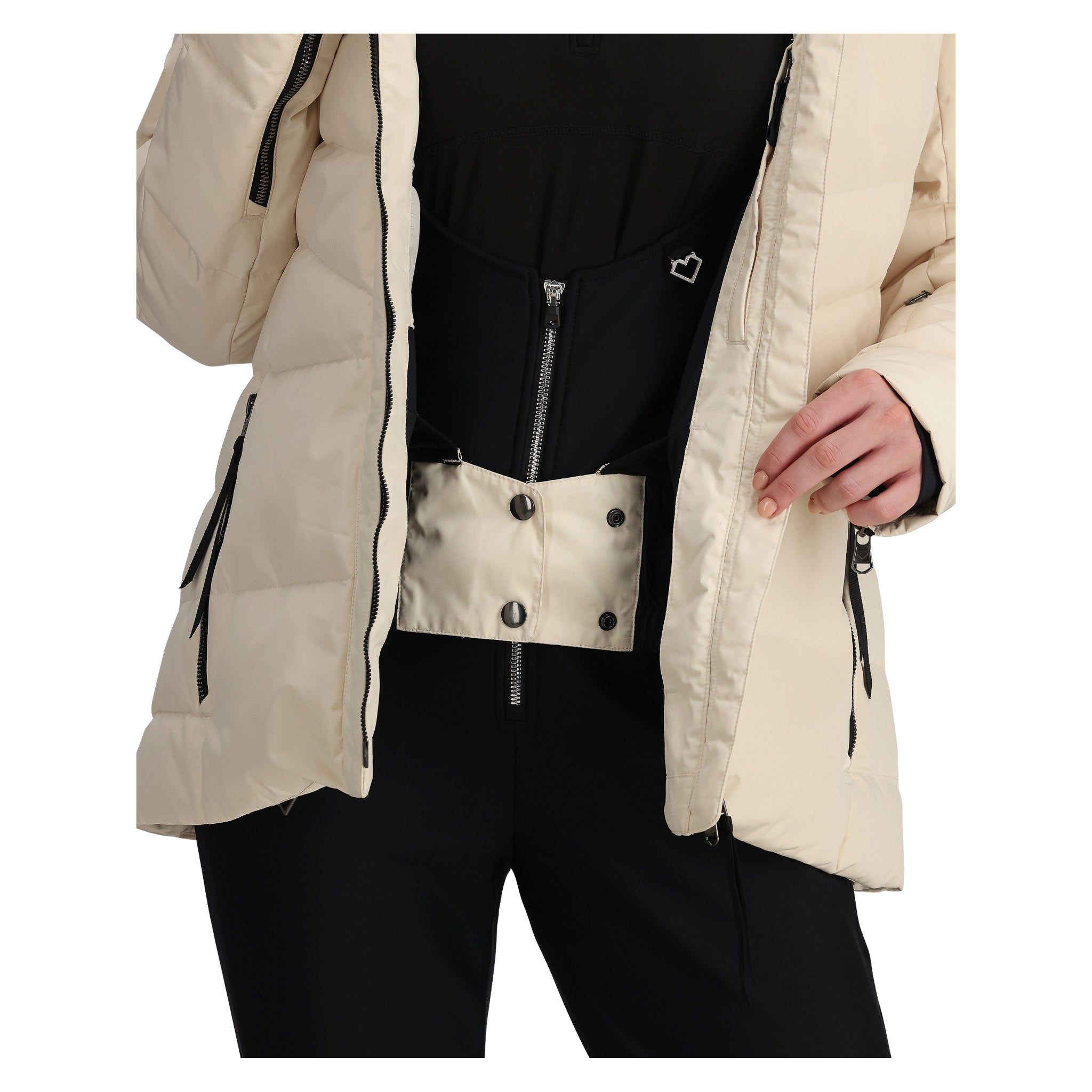 Obermeyer Women's Circe Down Jacket - A cream-colored down jacket with a black zipper and two zippered pockets on either side.