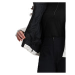 Obermeyer Women's Calypso Down Jacket - A black down jacket with a white zipper and two zippered pockets on the front.