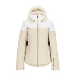Obermeyer Women's Cristallo Insulated Jacket 2025 - A cream-colored jacket with a hood, featuring two zippered pockets on either side and silver snap buttons at the collar.
