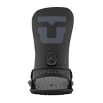 Union Strata Snowboard Bindings 2025 - A black snowboard binding with a large "U" logo on top and a small circular screw in the middle.