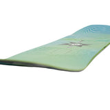 Nitro Youth Ripper x Volcom Snowboard 2025 - A light blue snowboard with a darker blue stripe and white wavy lines on top, featuring a black logo in the center.