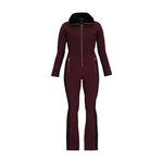 Obermeyer Women's Katze Insulated Suit 2025 - A burgundy insulated suit with a black faux fur-lined hood and gold zipper.