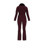 Obermeyer Women's Katze Insulated Suit 2025 - A dark maroon snowsuit with a black faux fur-lined hood and gold zipper accents on the front, arms, and legs.