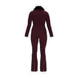 Obermeyer Women's Katze Insulated Suit 2025 - A dark maroon snowsuit with a black faux fur-lined hood and gold zipper accents on the front, arms, and legs.