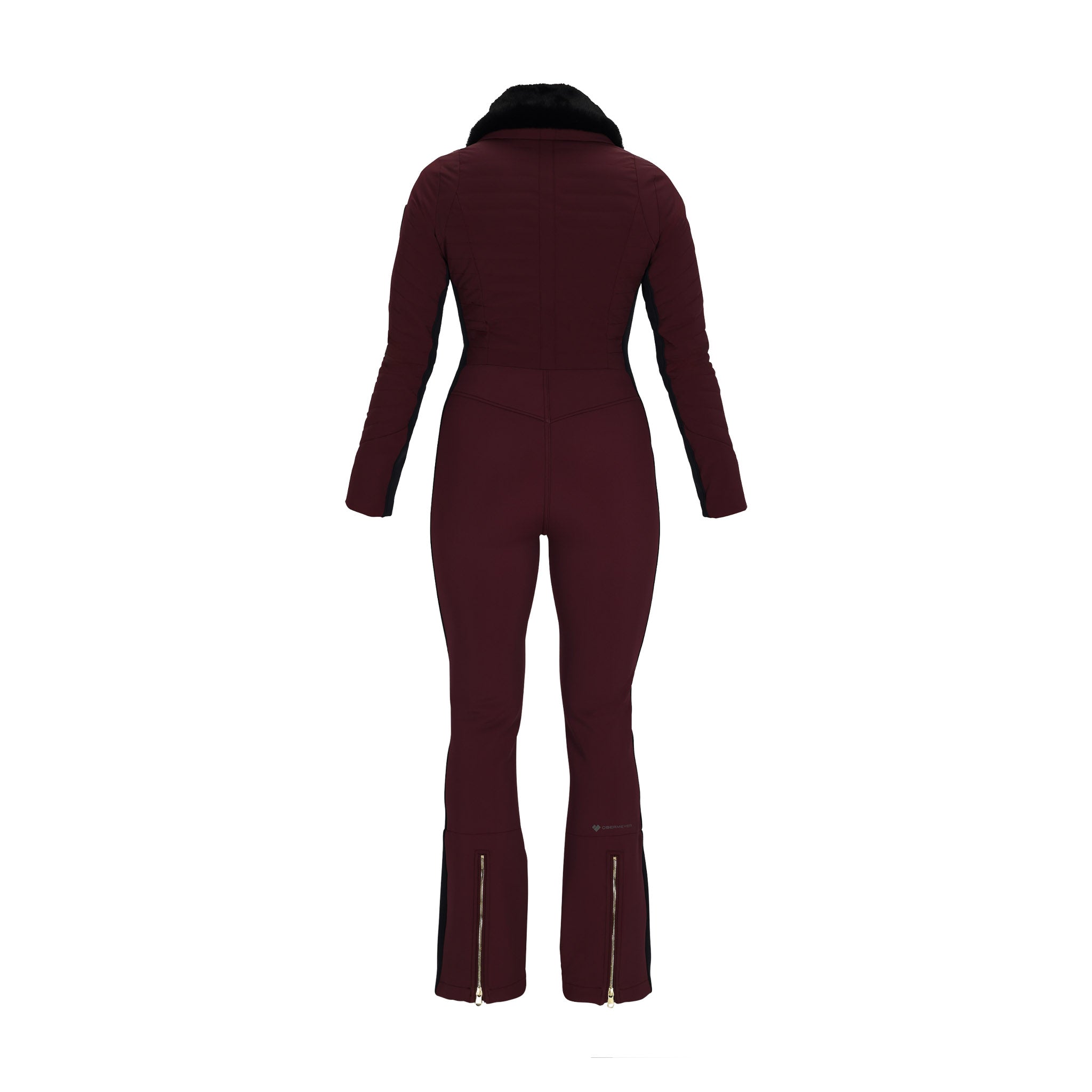 Obermeyer Women's Katze Insulated Suit 2025 - A dark maroon snowsuit with a black faux fur-lined hood and gold zipper accents on the front, arms, and legs.