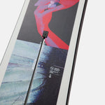 Burton Talent Scout Snowboard 2025 - A black snowboard with a white logo on top of a blue and red graphic design.