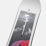Burton Talent Scout Snowboard 2025 - A black-and-white snowboard with a white stripe and red accents on the top sheet.