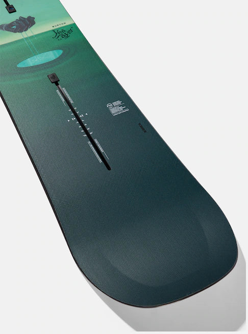 Burton Women's Yeasayer Snowboard 2025 - A green and blue snowboard with a circular design on top.