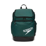 Speedo Teamster 2.0 Swim Backpack - A dark green backpack with a zippered main compartment and two side pockets, featuring a black handle and shoulder straps.