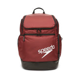 Speedo Teamster 2.0 Swim Backpack - A red backpack with a zippered main compartment and two side pockets, featuring black trim and straps.