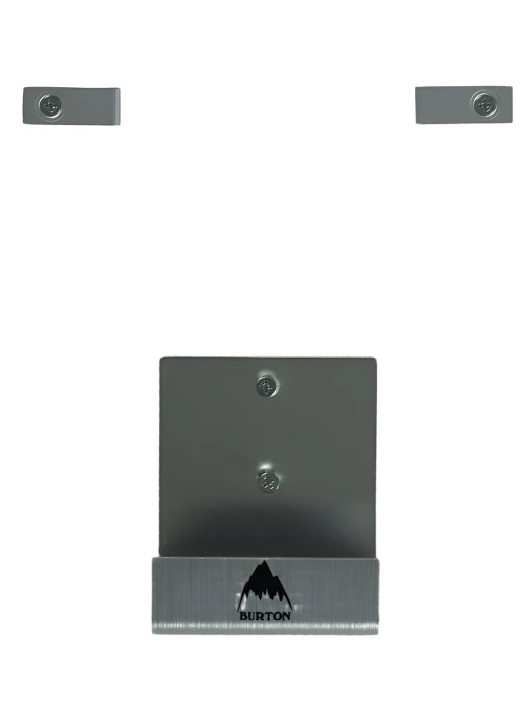 Burton Collectors Edition Snowboard Wall Mounts 2025 - A metal wall mount with two screw holes and a small circular logo on the top left corner.