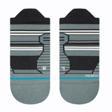Ninedys Tab Sock 2024 - A pair of gray socks with a blue stripe at the top and a white logo on the foot.