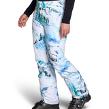 Women’s insulated ski pants, white with teal and dark print, side view