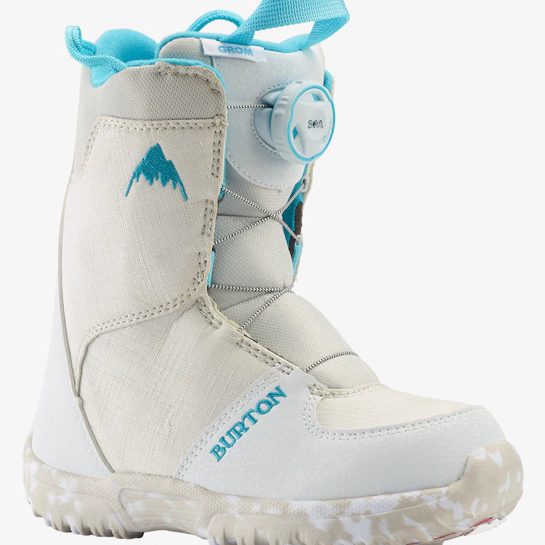Burton Junior's Grom Boa Snowboard Boot 2025 - A white snowboard boot with a blue logo on the side and a round white dial on the top.