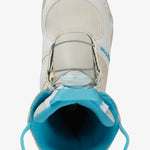 Burton Junior's Grom Boa Snowboard Boot 2025 - White snowboard boot with a blue logo on the side and a white strap with a blue buckle.