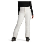 Obermeyer Women's Bliss Insulated Pant 2025 - A pair of white insulated ski pants with zippered pockets and a button fly.