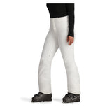 Obermeyer Women's Bliss Insulated Pant 2025 - A pair of white insulated ski pants with a zippered pocket on the side and a small zipper at the top.