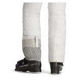 Obermeyer Women's Bliss Insulated Pant 2025 - A pair of white insulated ski pants with a zippered pocket on the side and a belt loop at the waist.