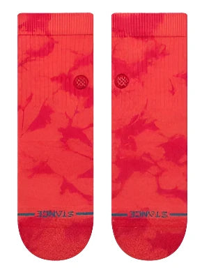 Stance Women's Dye Namic Quarter Sock 2024 - A coral-colored sock with a subtle marbled pattern and a small circular logo on top.