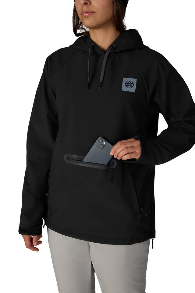 Women's black waterproof hoodie with drawstring hood, chest logo patch, and front pocket