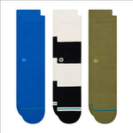 Poniente C Sock 3 Pack 2022 - A three-pack of socks in a mix of colors, featuring a small white logo on the ankle area.