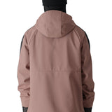 The 686 Waterproof Anorak Jacket 2025 is primarily light brown with black accents on the sleeves.