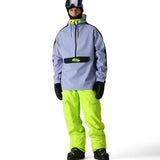 The 686 Waterproof Anorak Jacket 2025 is primarily light gray with neon yellow accents on the hood and chest pocket.