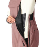 The 686 Black Magic Insulated Bib from 2025 is showcased in this image, presented in black.