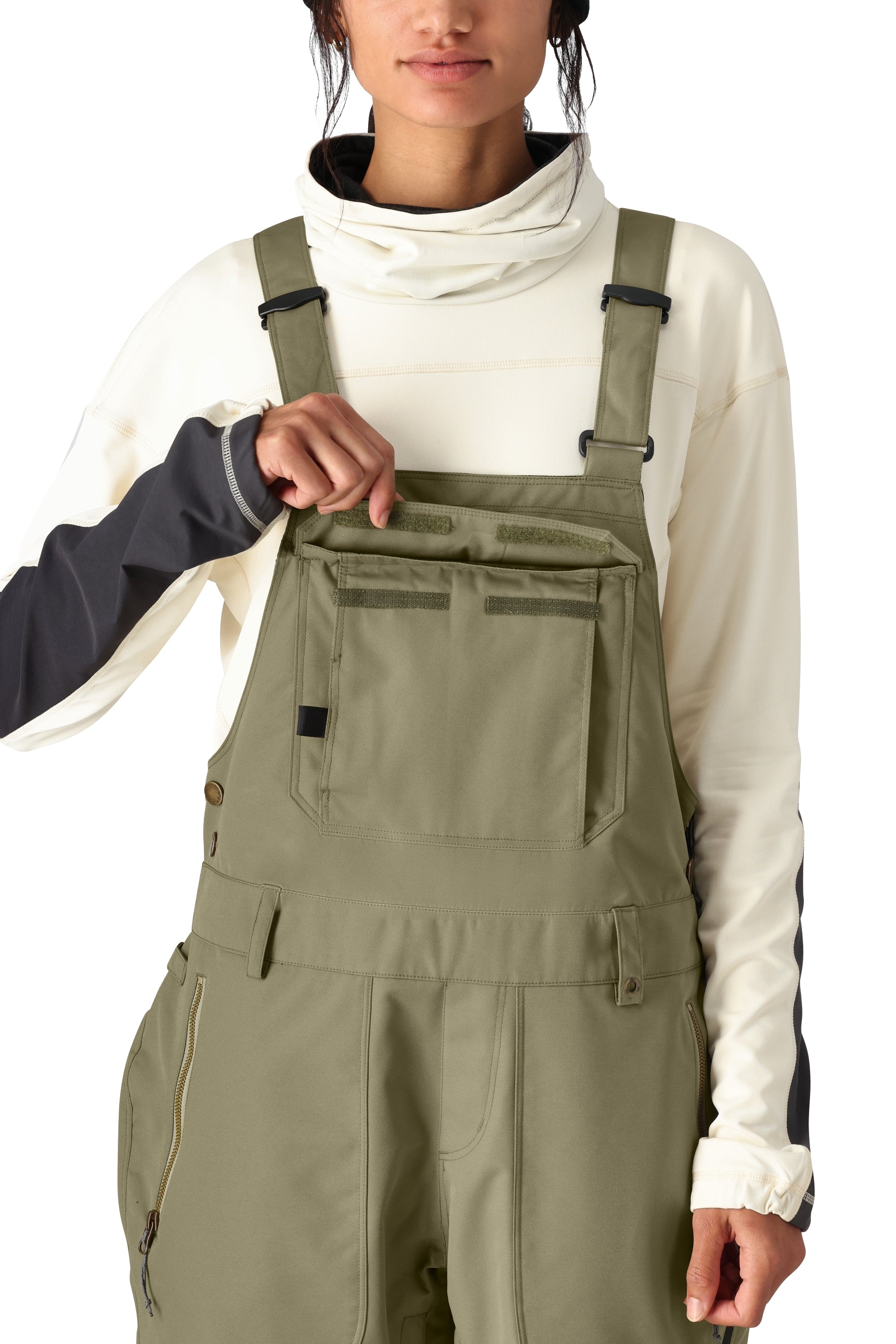 The 686 Women's Black Magic Insulated Bib 2025 appears in a black color with an insulated hood.