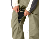 The 686 Women's Black Magic Insulated Bib features a sleek black color with a zippered fly on the front view.