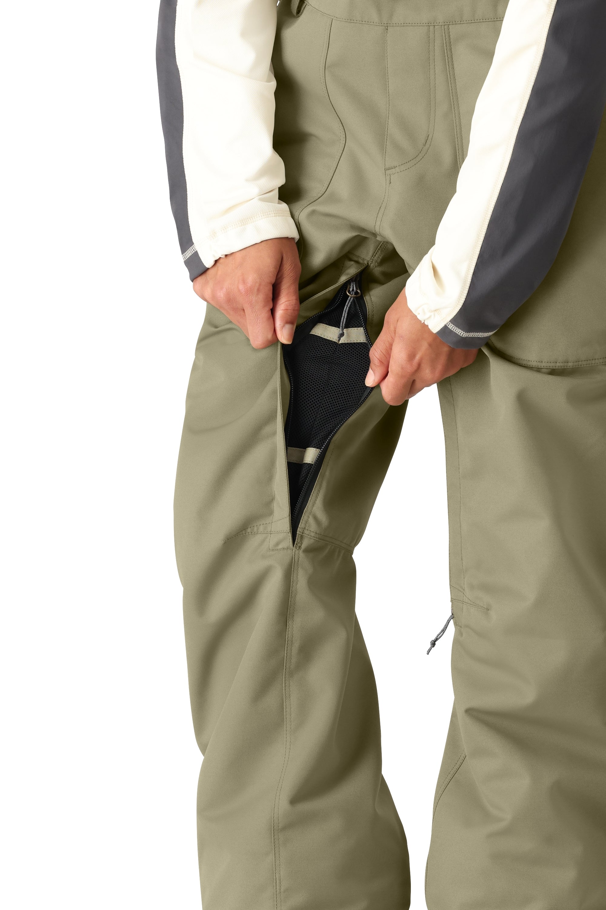 The 686 Women's Black Magic Insulated Bib features a sleek black color with a zippered fly on the front view.