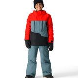 The 686 Youth GEO Insulated Jacket 2025 is predominantly red with a black and blue-grey color block design on the front.