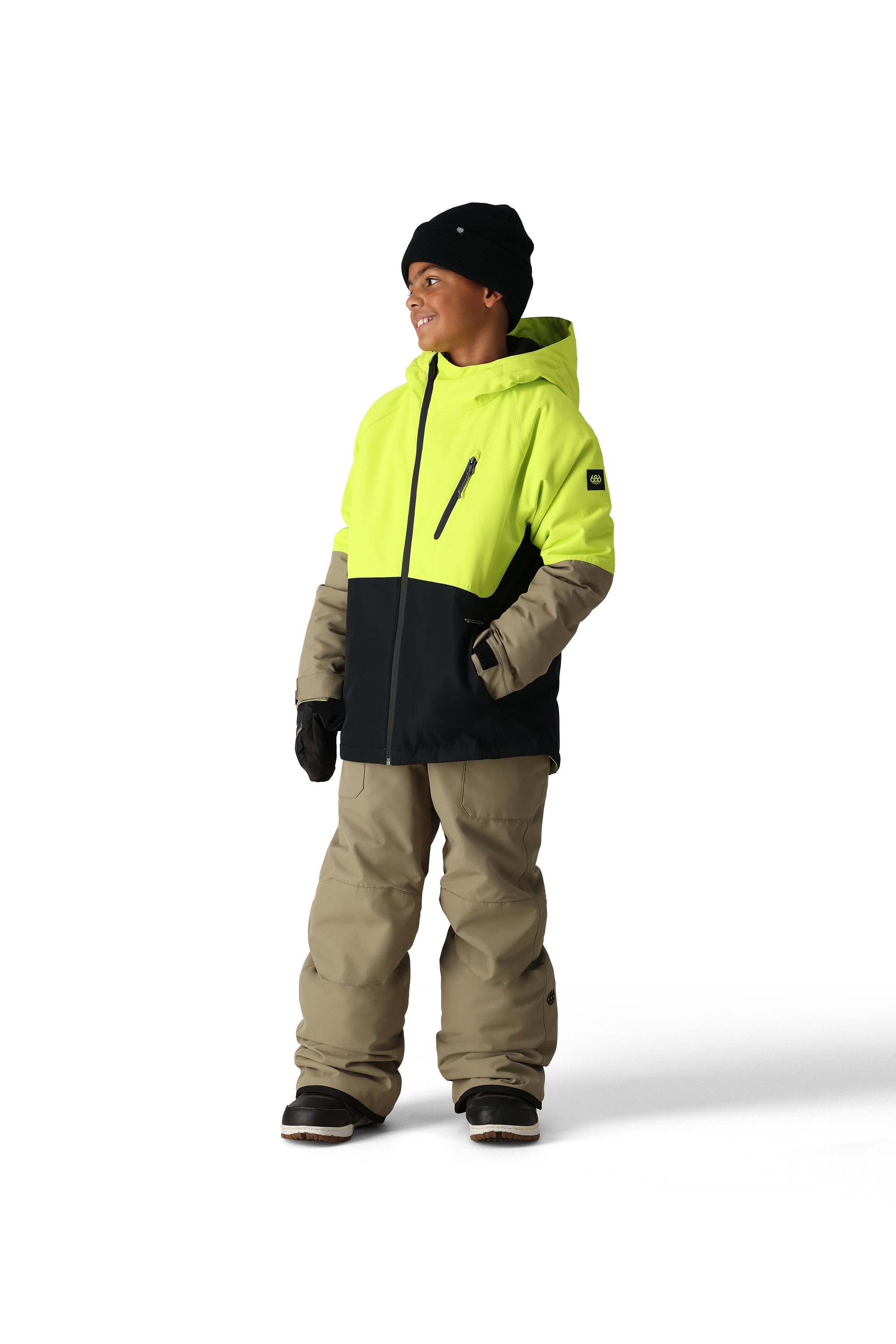 The 686 Hydra Insulated Jacket in neon yellow and black has a front zippered pocket.