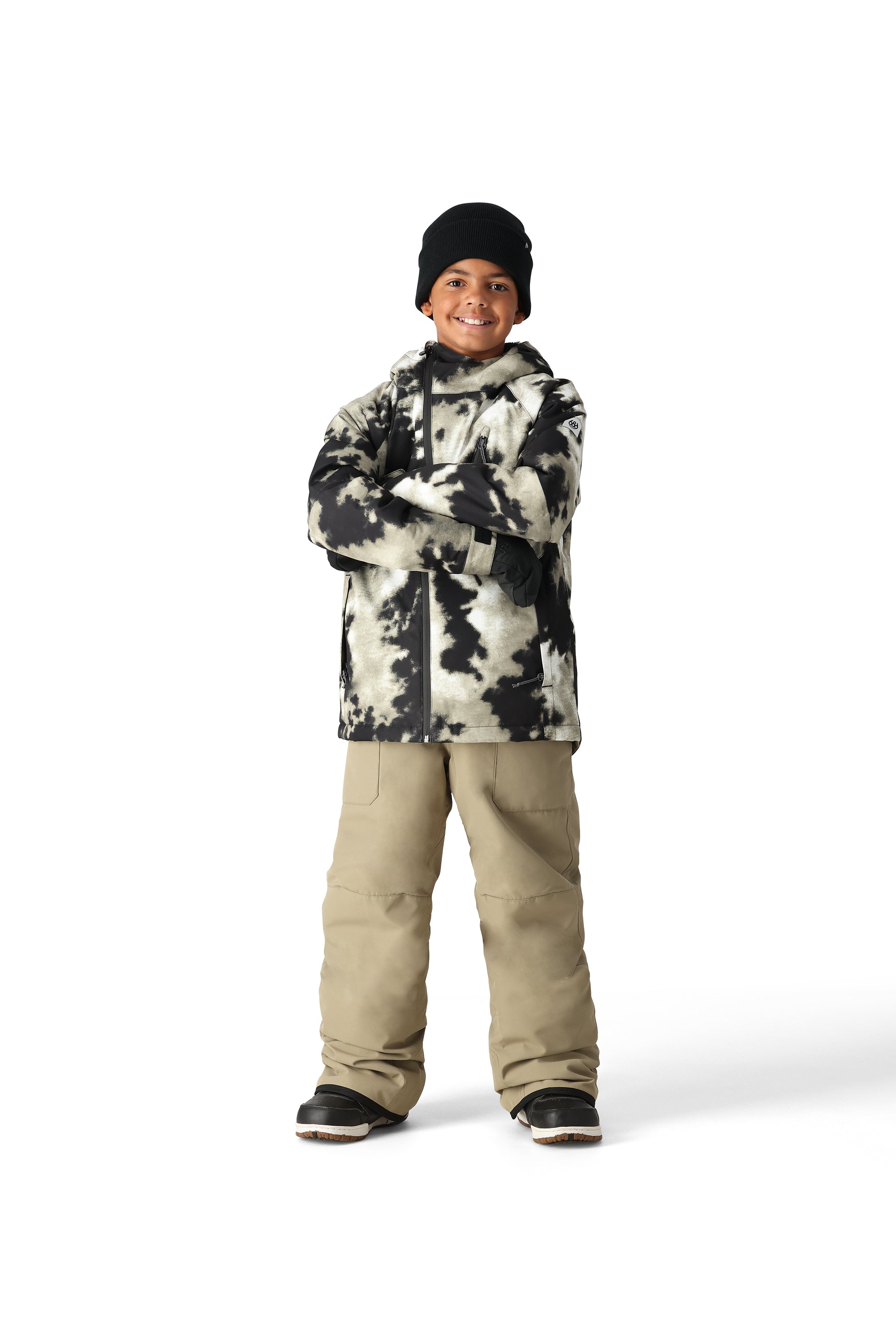 The 686 Boys' Hydra Insulated Jacket 2025 is pictured from the front, showcasing its black and white tie-dye pattern.