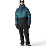 The 686 Foundation Insulated Jacket 2025 has a gradient blue and black color scheme with a hood.