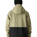 The 686 Foundation Insulated Jacket 2025 is pictured from the back in khaki and black.