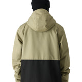 The 686 Foundation Insulated Jacket 2025 is pictured from the back in khaki and black.