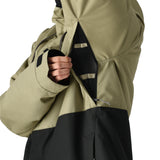 The 686 Foundation Insulated Jacket 2025 has an olive green and black color block design with a zippered front and thumb holes.
