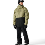 The 686 Foundation Insulated Jacket 2025 is shown in an olive green and black color combination with a high collar.