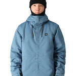 The 686 Foundation Insulated Jacket is shown in light blue with a black drawstring at the neck and an insulated hood.